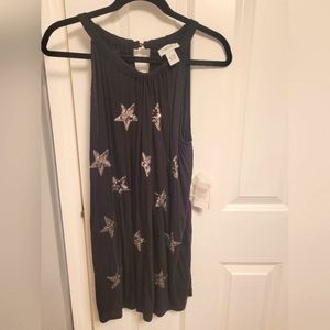 Black sleeveless tunic with sparkly stars